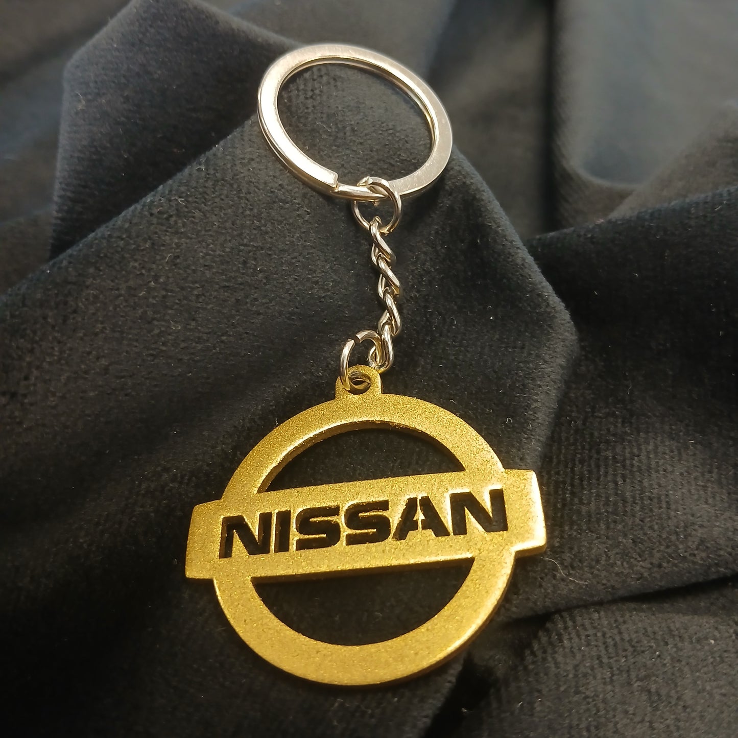 Brelok logo Nissan