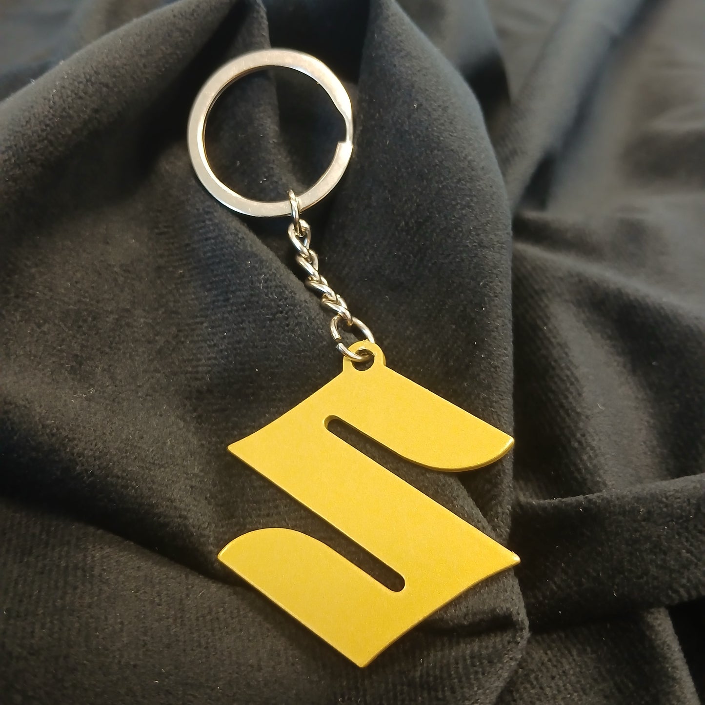 Brelok logo Suzuki