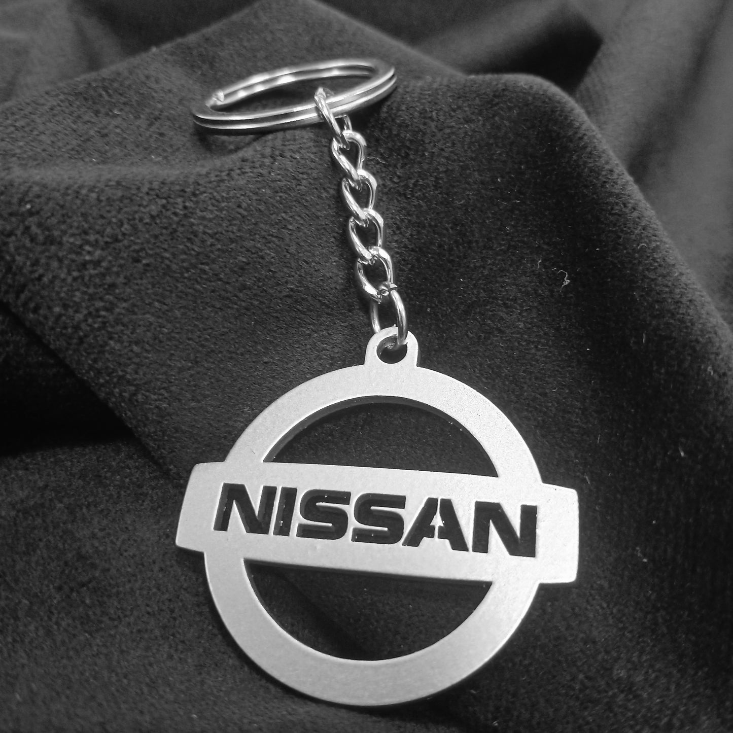 Brelok logo Nissan